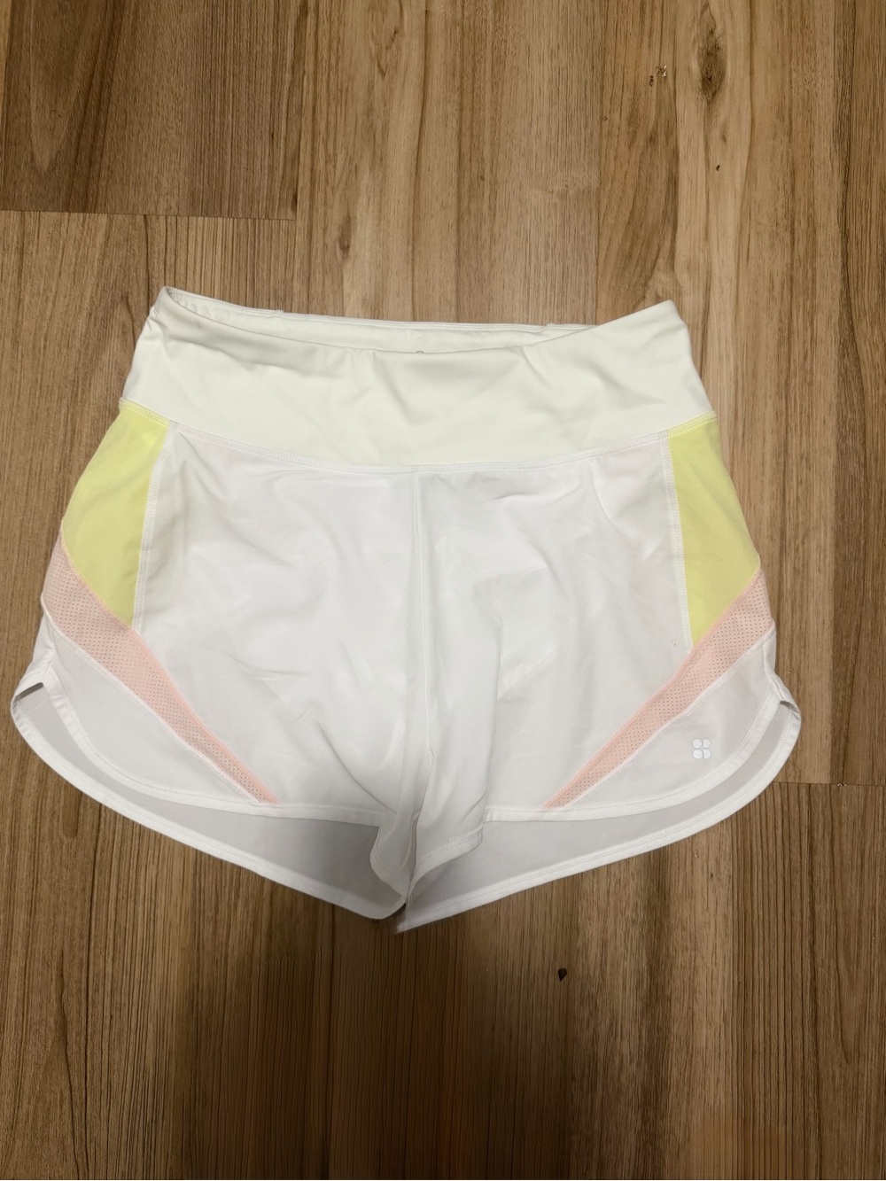Sweaty Betty White Athletic Shorts with Pink and Yellow Accents - Picture 3 of 5